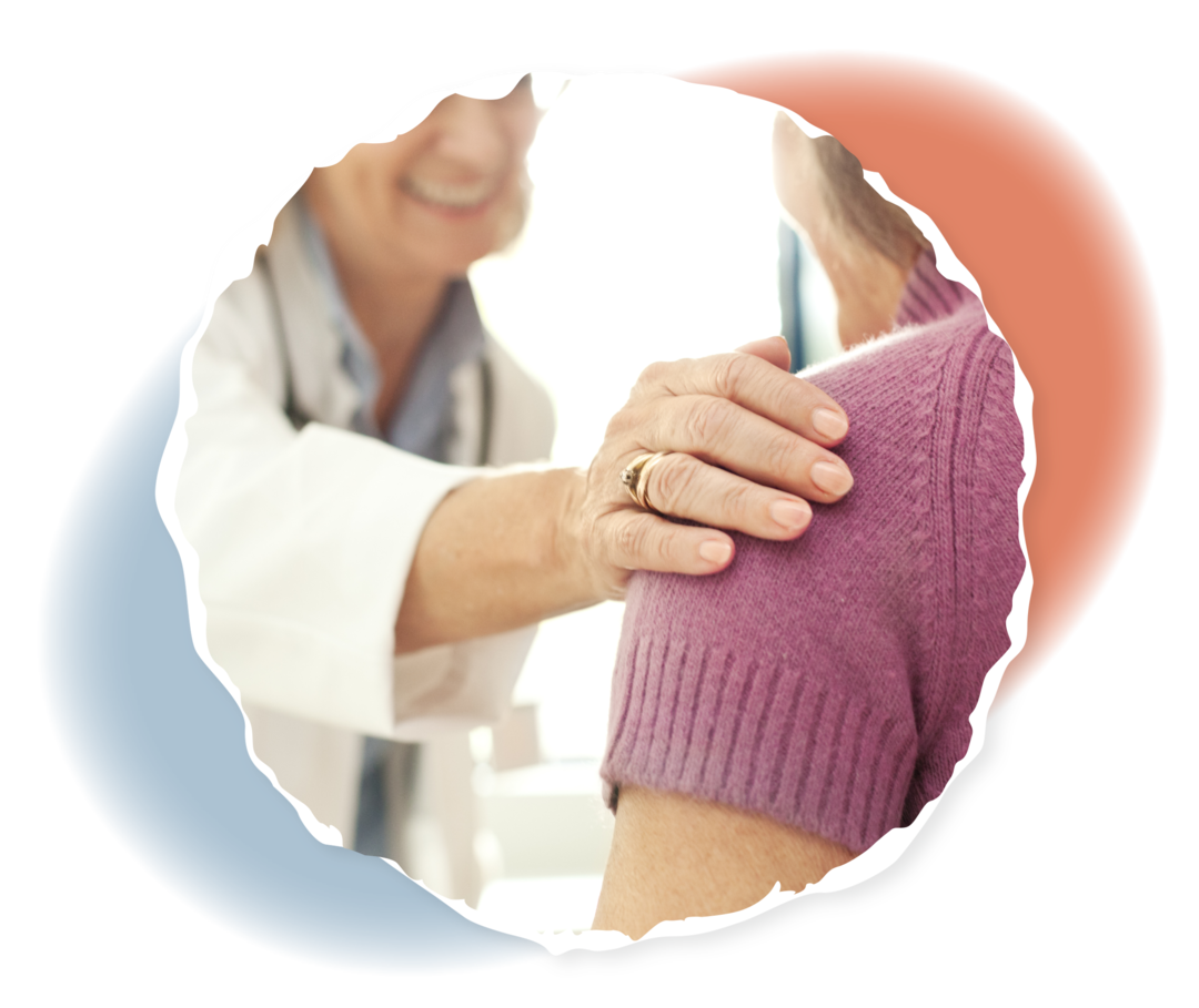 FL: Gutes Arzt-Patienten-Verhältnis Eine Ärztin legt ihre Hand auf die Schulter einer Patientin.